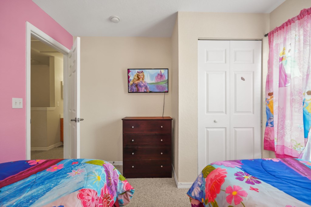 Bedroom # 4 upstairs with 2 Twin size beds Disney Princess Themed & Smart TV.