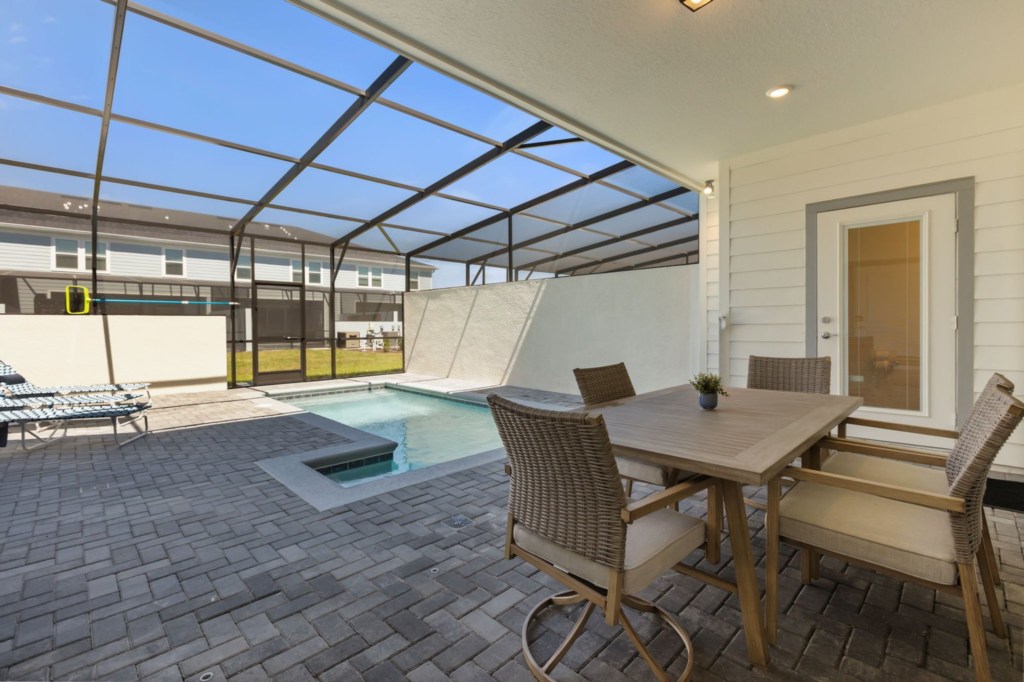 Covered patio & private pool — 16258 Coastal Cove Lane, photo 36 of 89