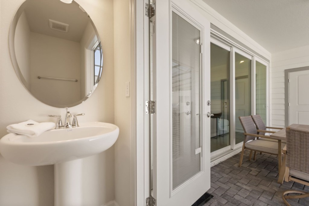 Half bathroom — 16258 Coastal Cove Lane, photo 45 of 89