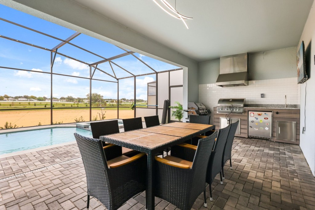 Covered patio — 15996 Sandy Cliffs Drive, photo 29 of 84