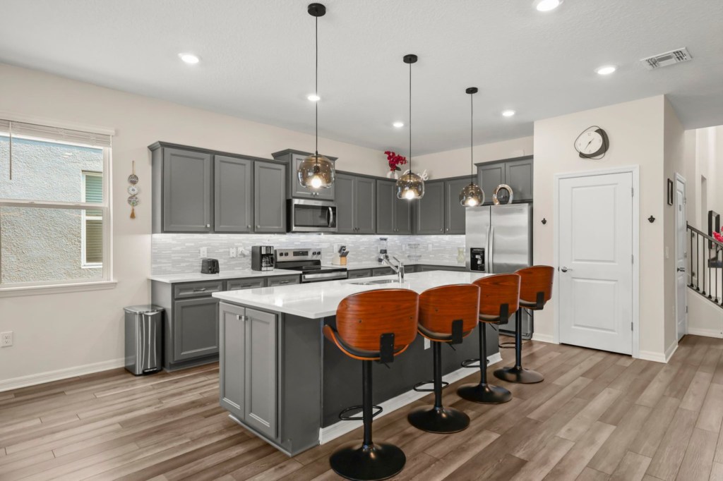 Kitchen — 15996 Sandy Cliffs Drive, photo 8 of 84