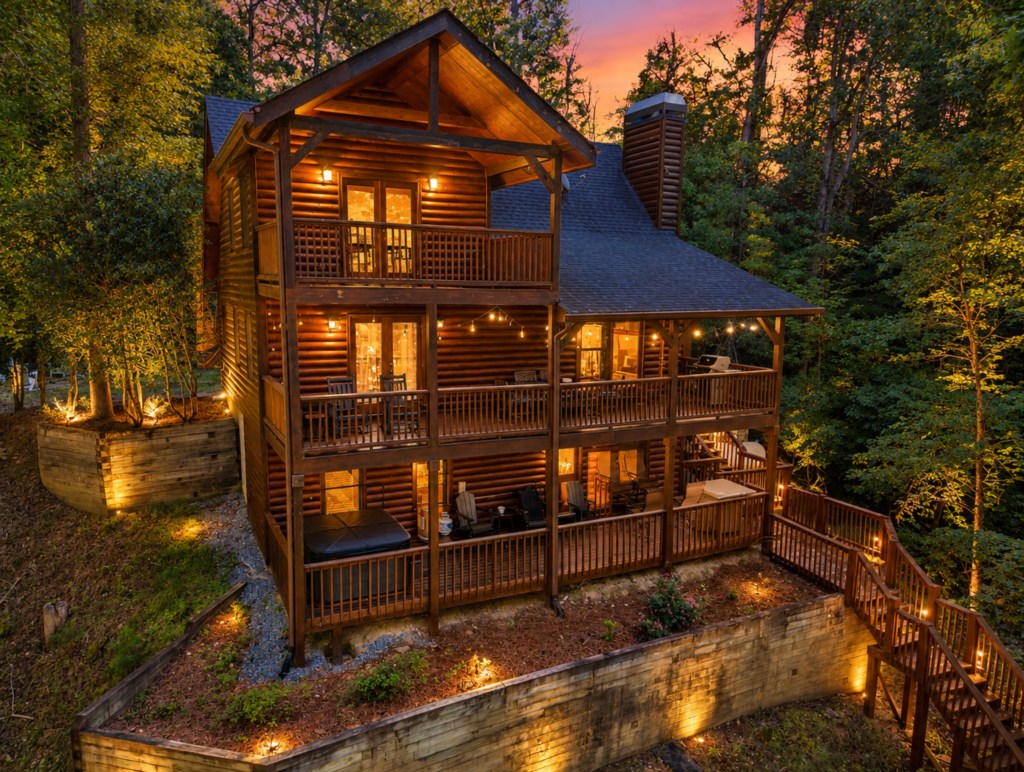 Charming log cabin retreat with spacious decks and serene forest views.