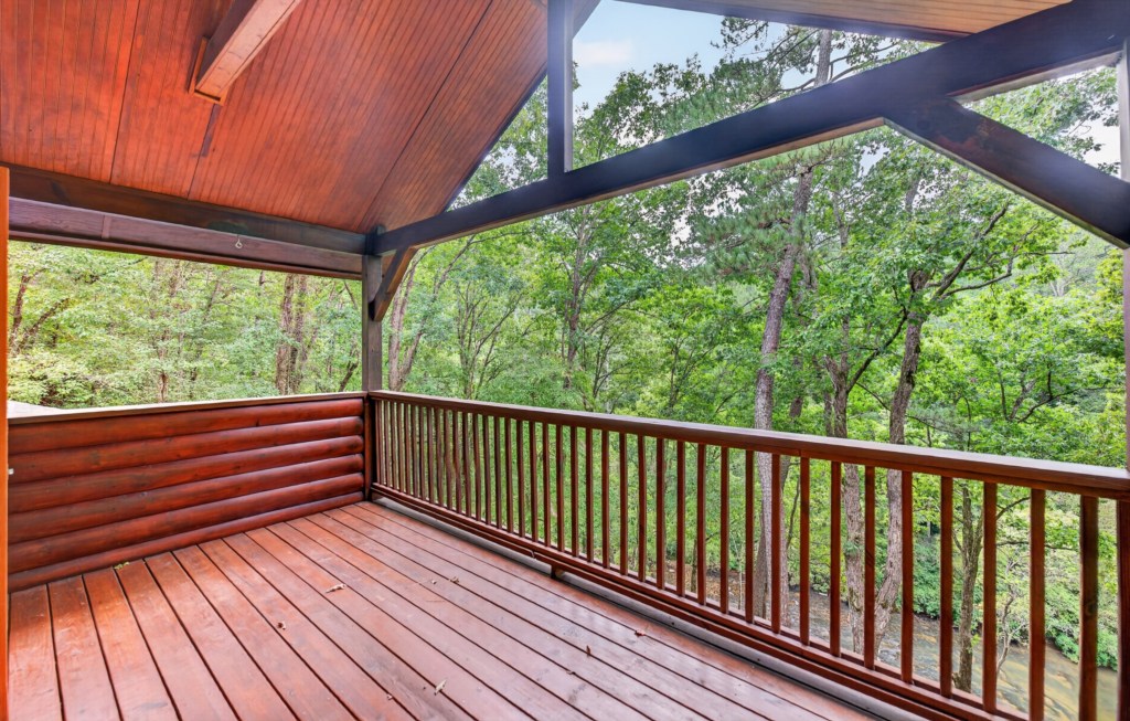 Relax on the spacious deck with serene forest views and fresh mountain air.