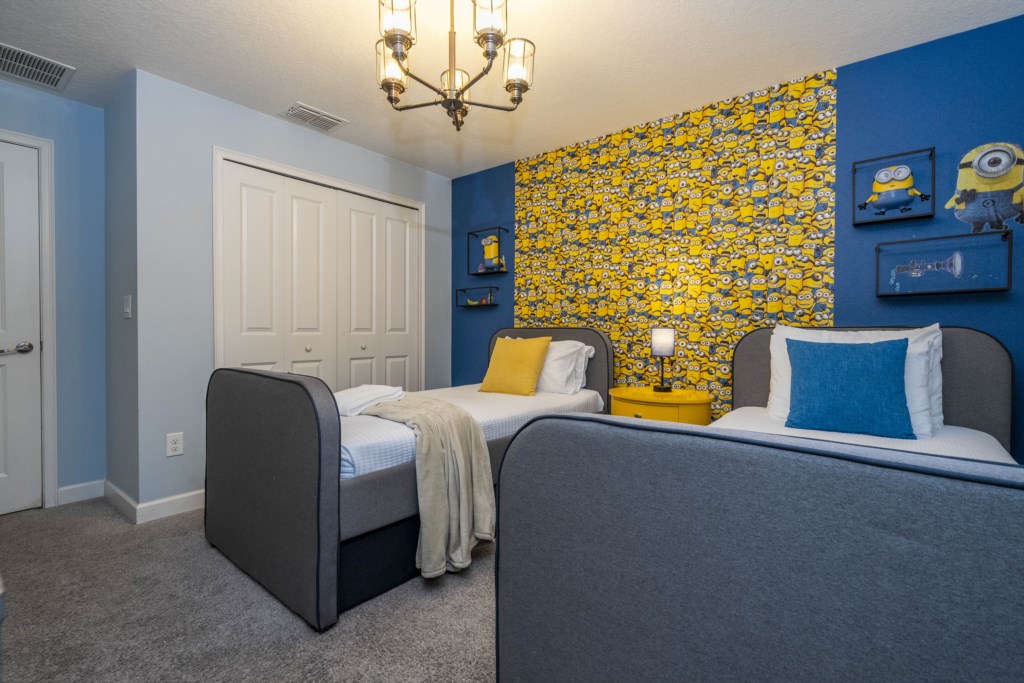 Twin bedroom Minions themed w/ TV