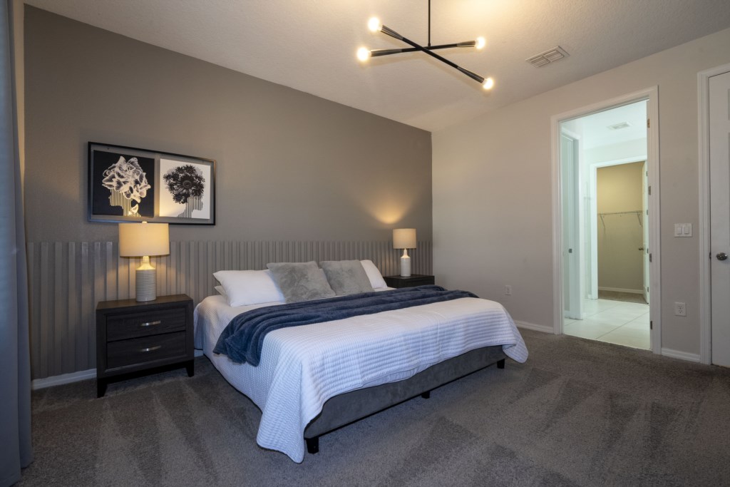 Master suite 1st floor w/ king size bed and TV
