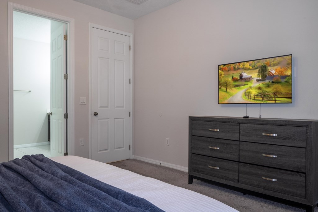 Master suite 1st floor w/ king size bed and TV