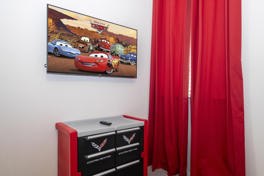 Cars themed bedroom w/ full + twin beds & TV