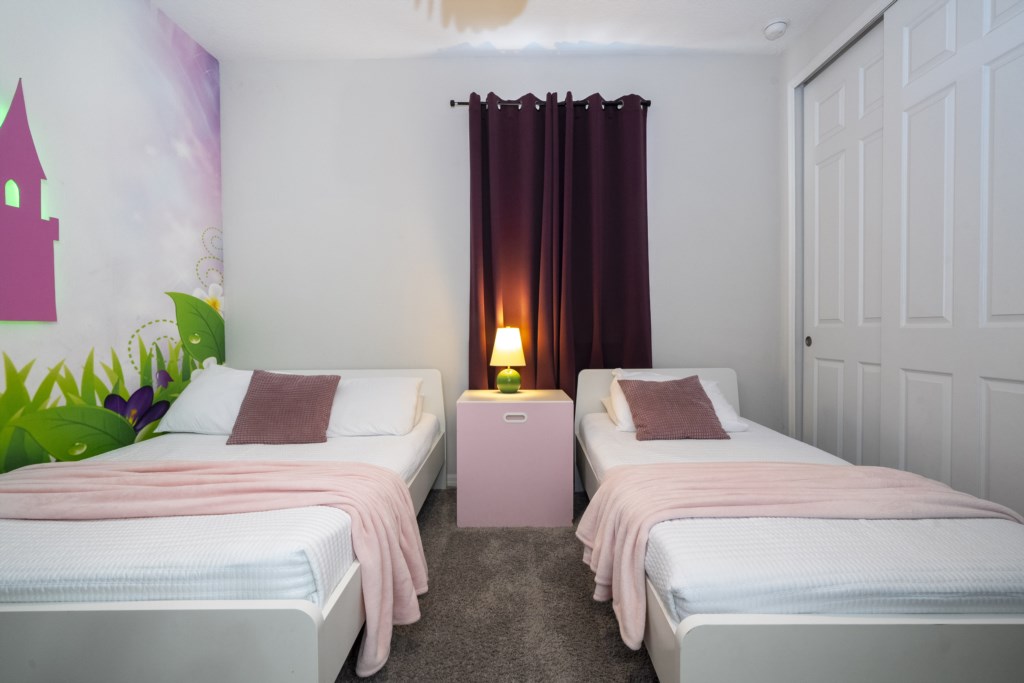 Princess themed bedroom w/ full + twin & TV