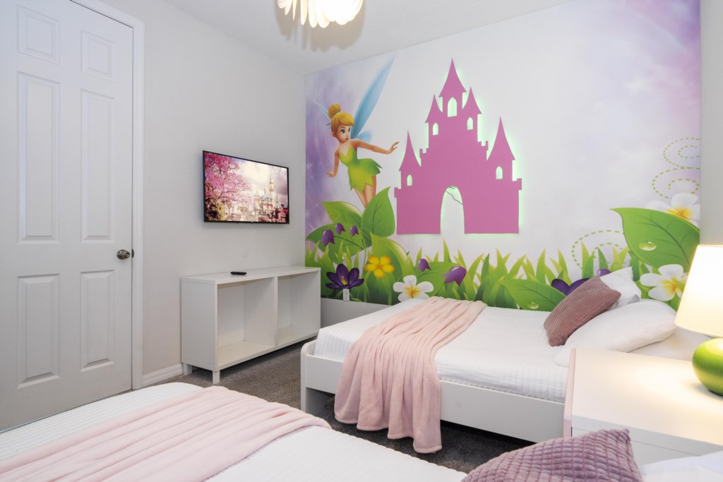 Princess bedroom w/ full + twin beds and TV