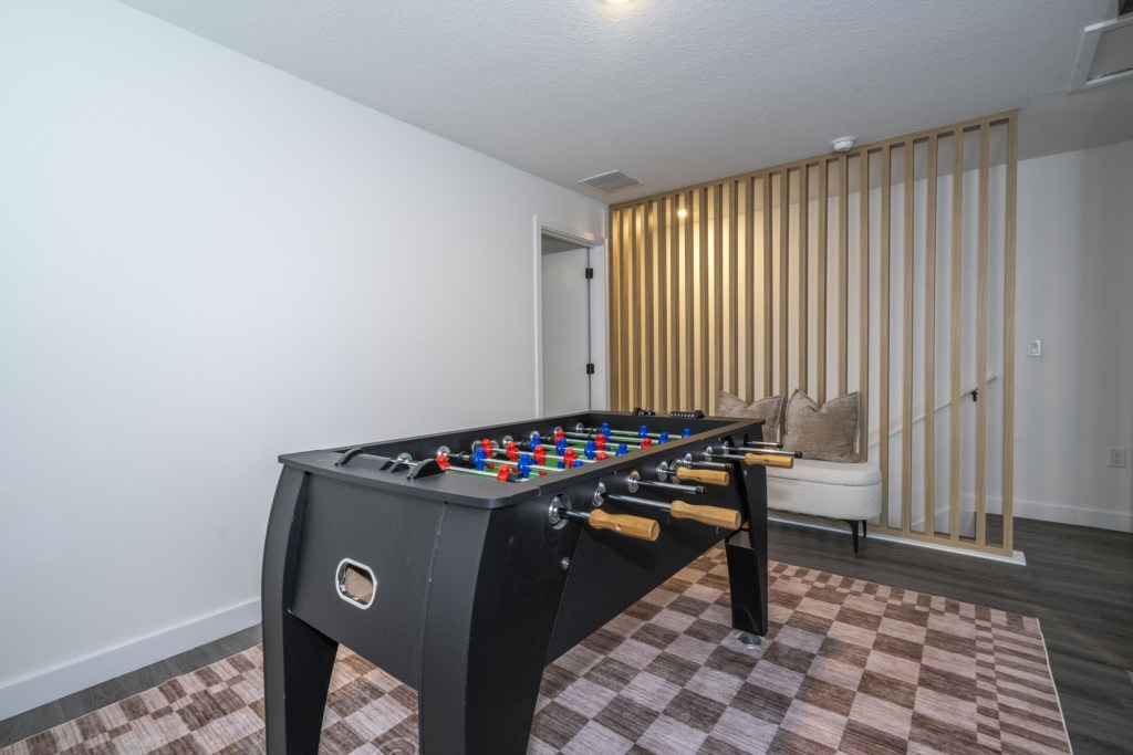 Loft with a foosball table