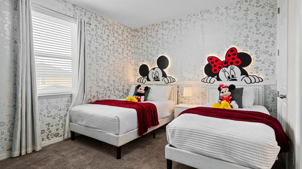 Mickey themed bedroom with full + twin