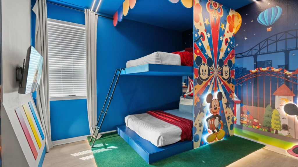 Mickey Circus themed bedroom w/ bunk bed full over full