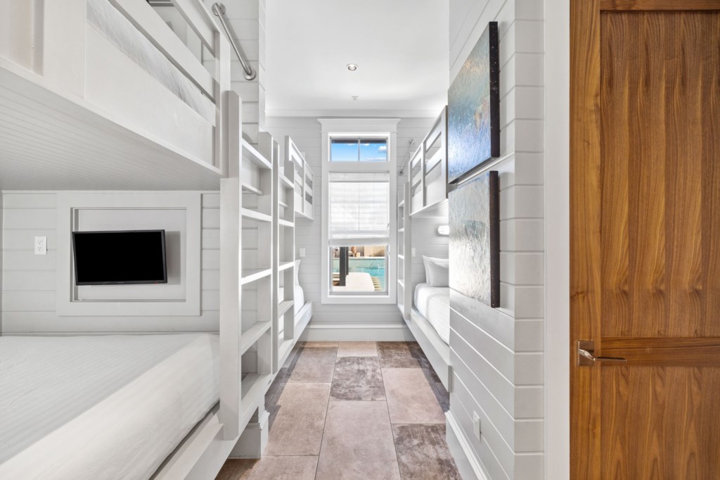 Guest Room With Two Queen-Over-Queen Bunk Beds and Twin-Over-Twin Bunk Bed On 1st Floor